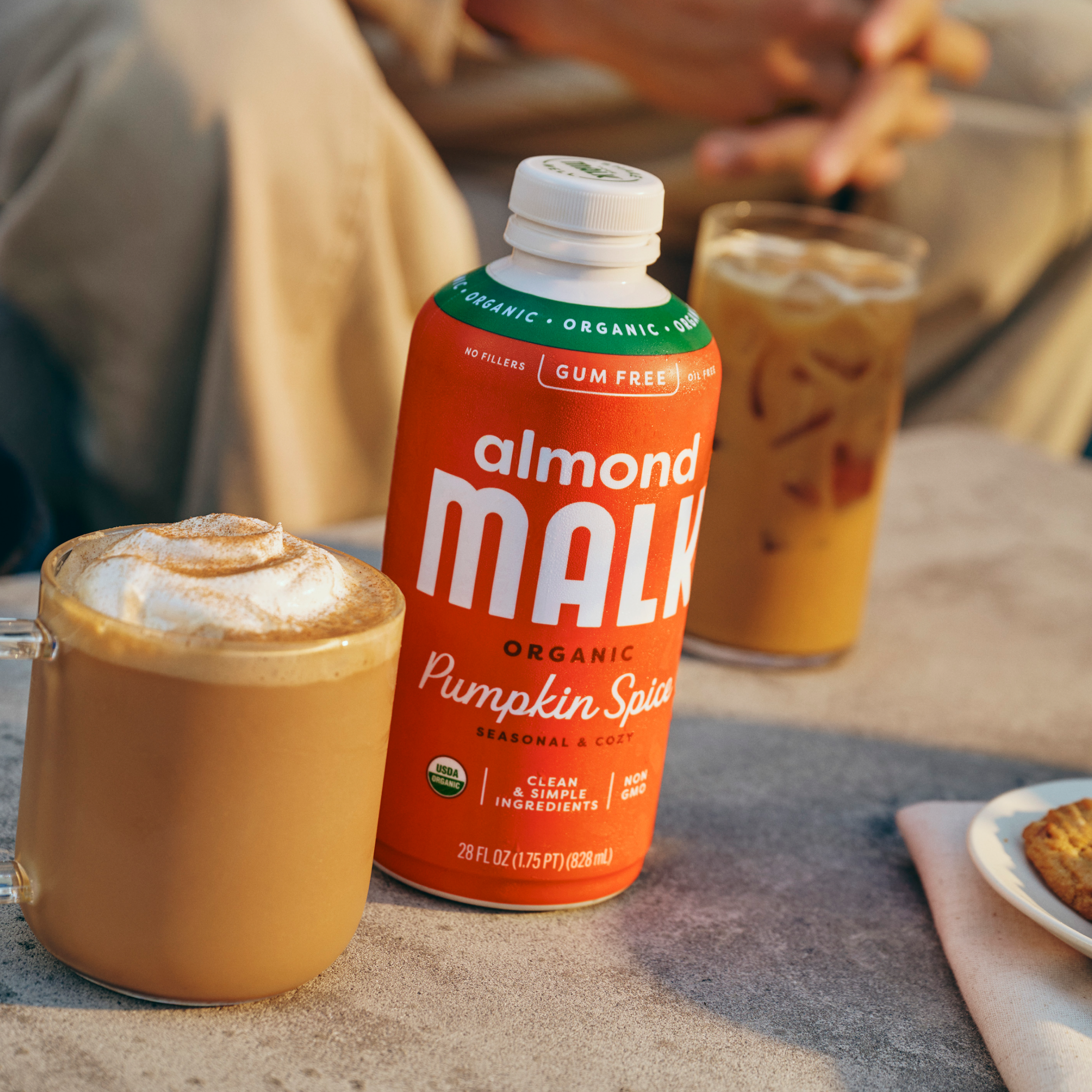 A bottle of Pumpkin Spice Almond MALK featuring lattes 