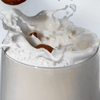 MALK Unsweetened Almond Milk Being Poured into Glass