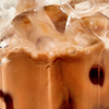 MALK Chocolate Almond Milk being poured into glass